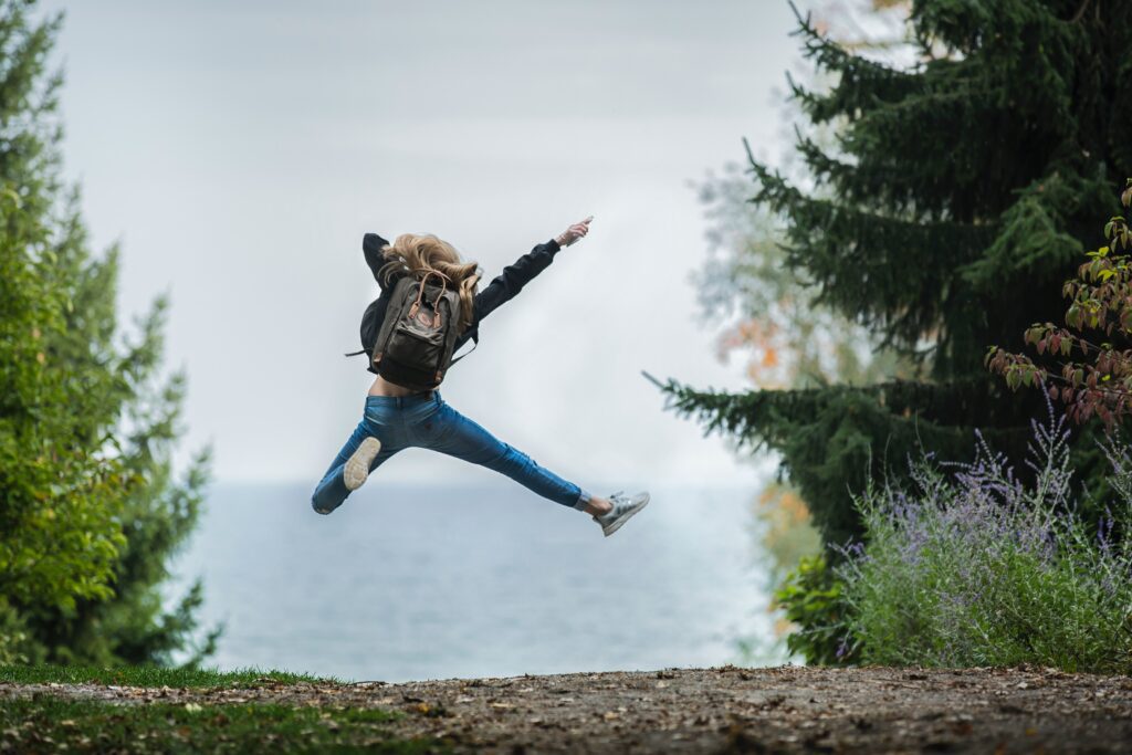 person excited jumping in air 