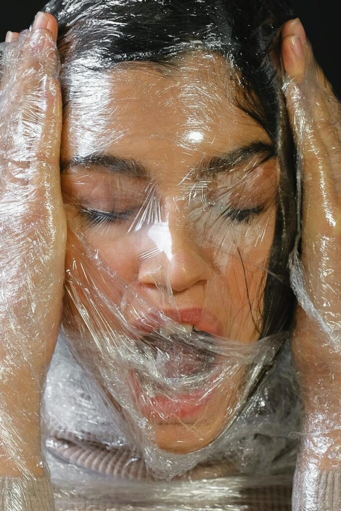 Person Wrapped In Plastic suffocating 