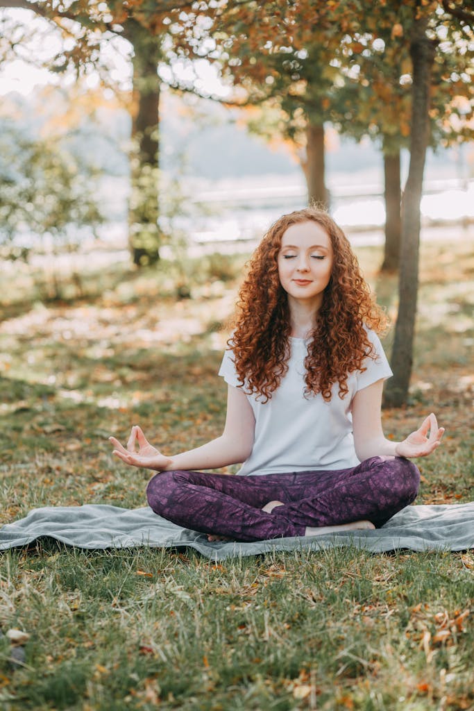 Photo Of Woman doing self care with Meditating