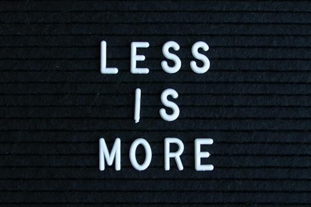 minimalist gratitude sign that says less is more