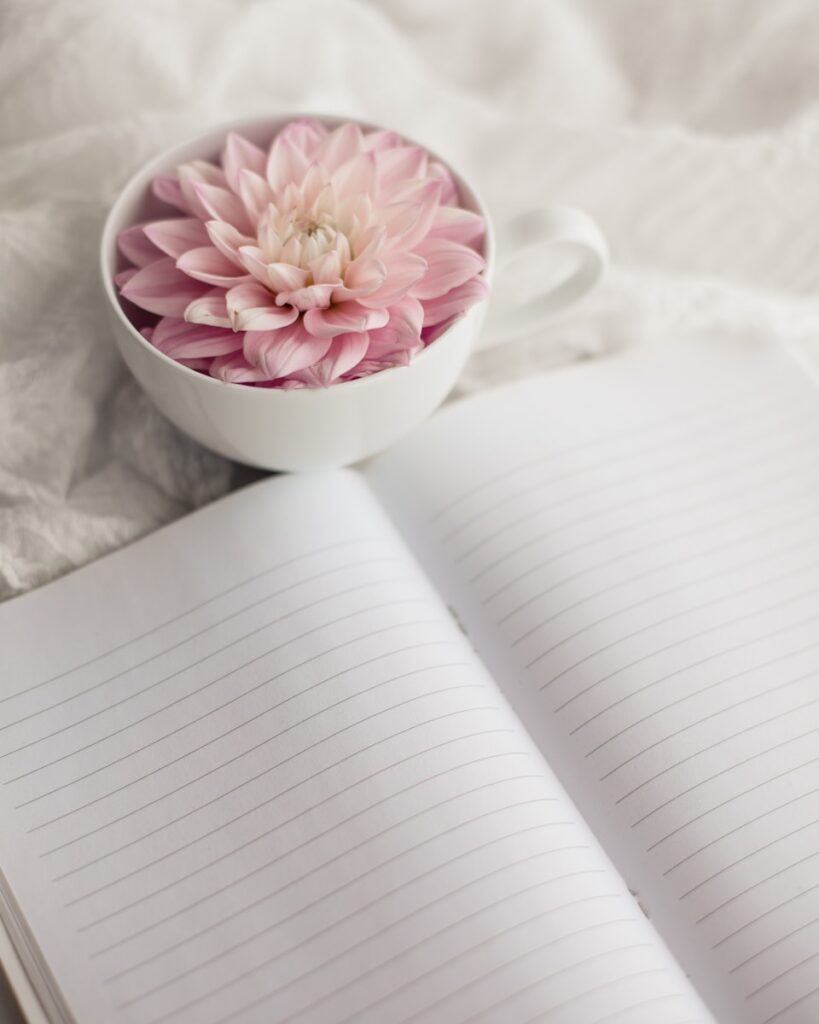 blank gratitude journal with pink flower